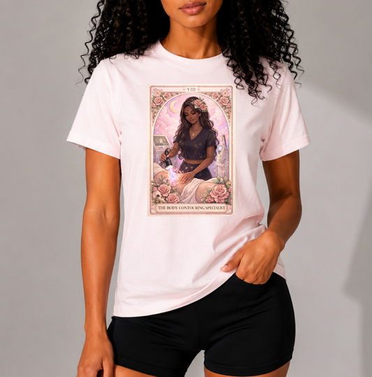 The Body Contouring Specialist (African American Doll) – Tarot Edition Tee